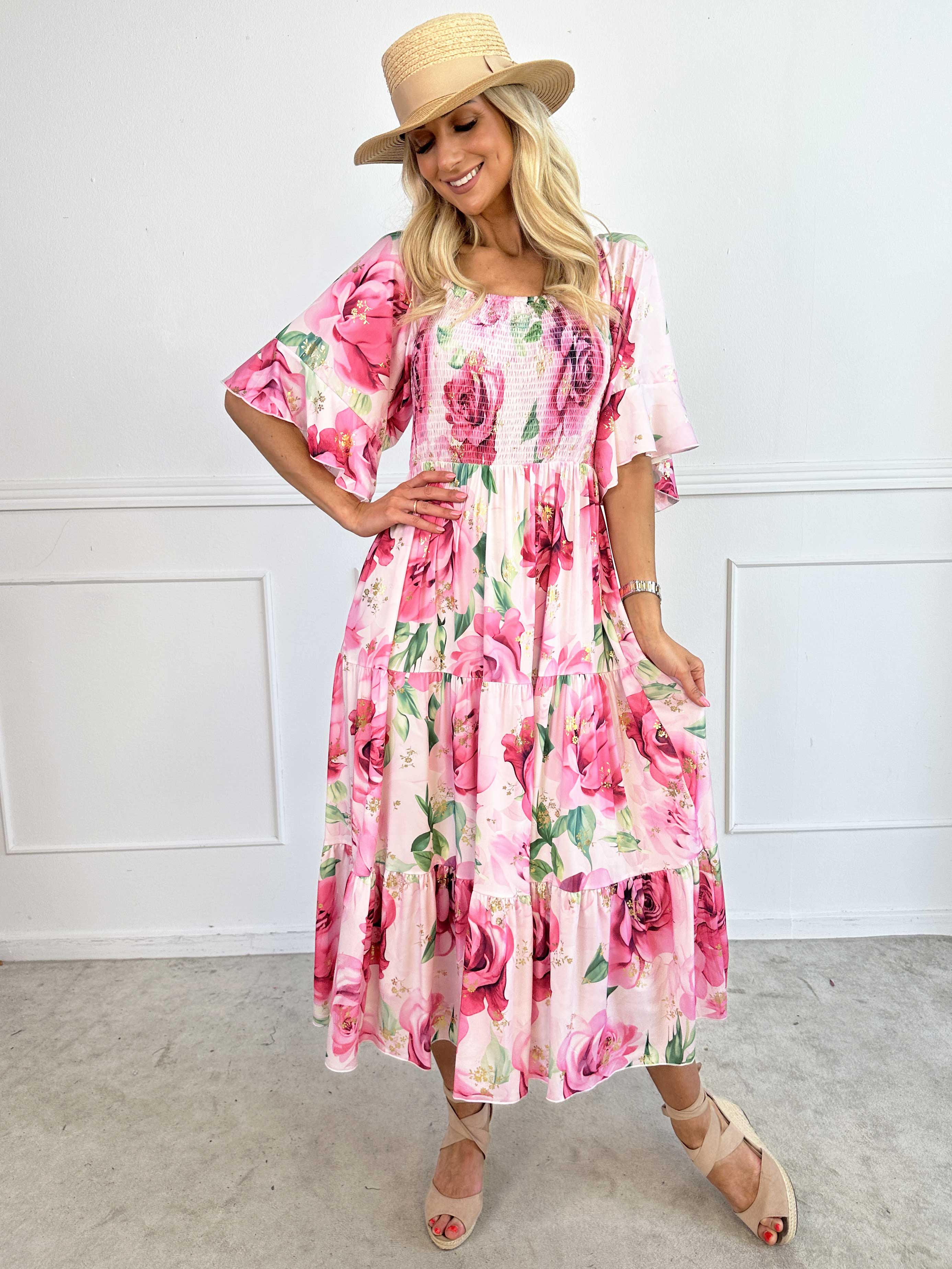 Elna Flower - Blomstret elastisk kjole med smock over brystet